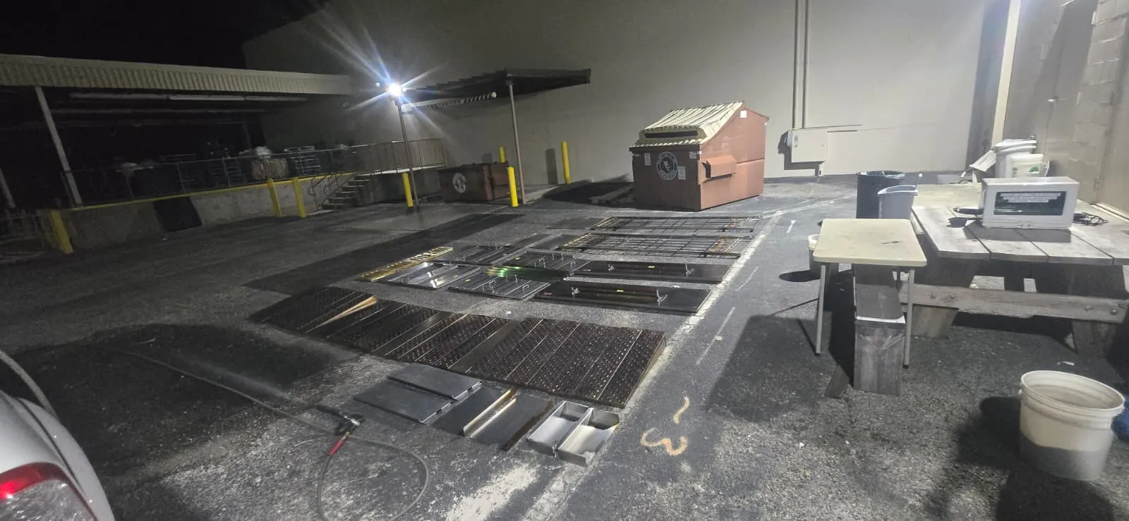 Hood filters and removable parts arranged for washing in an outdoor work area at night